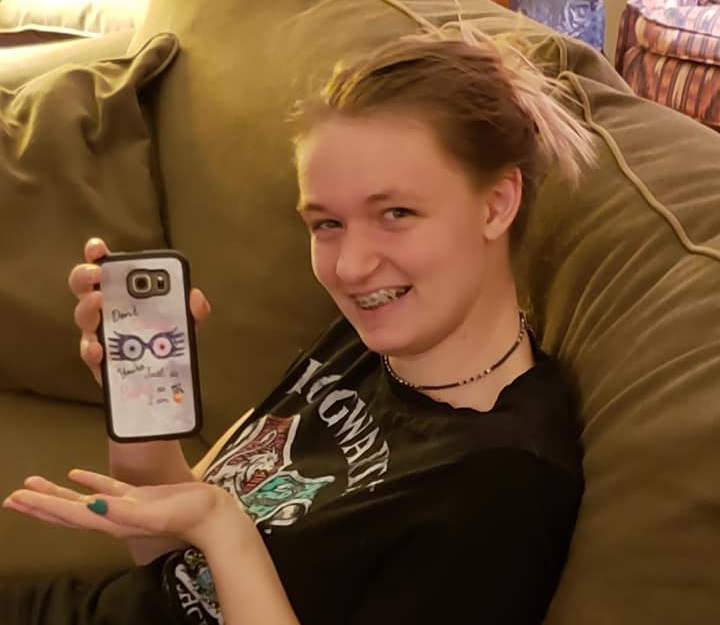 2018-03-30 Cate at 14 withphone.jpg